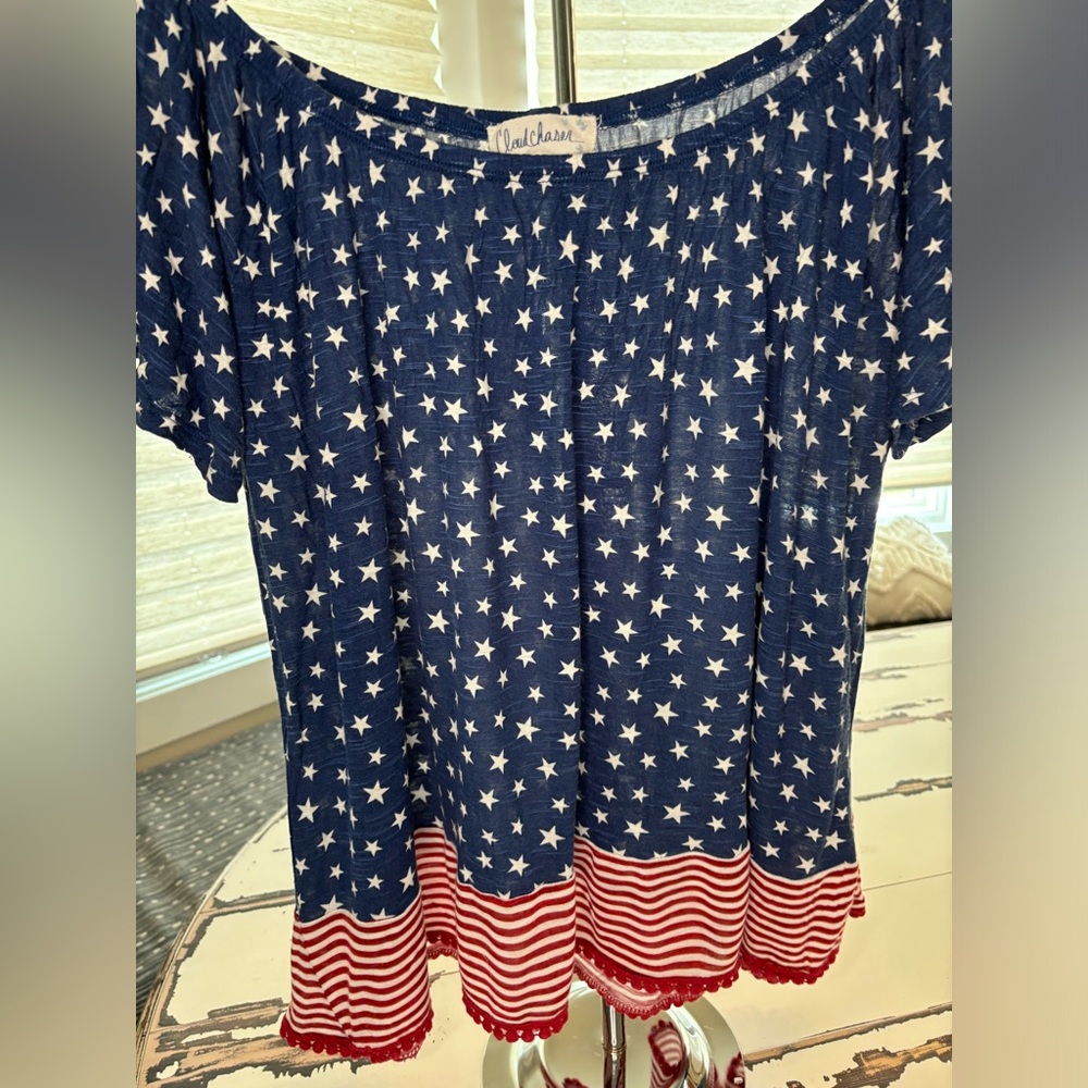 Red, white, and blue off the shoulder top! Stars and stripes galore!